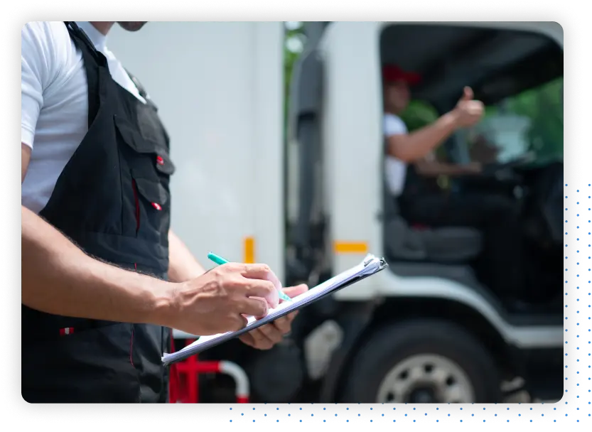Person writing on clipboard
