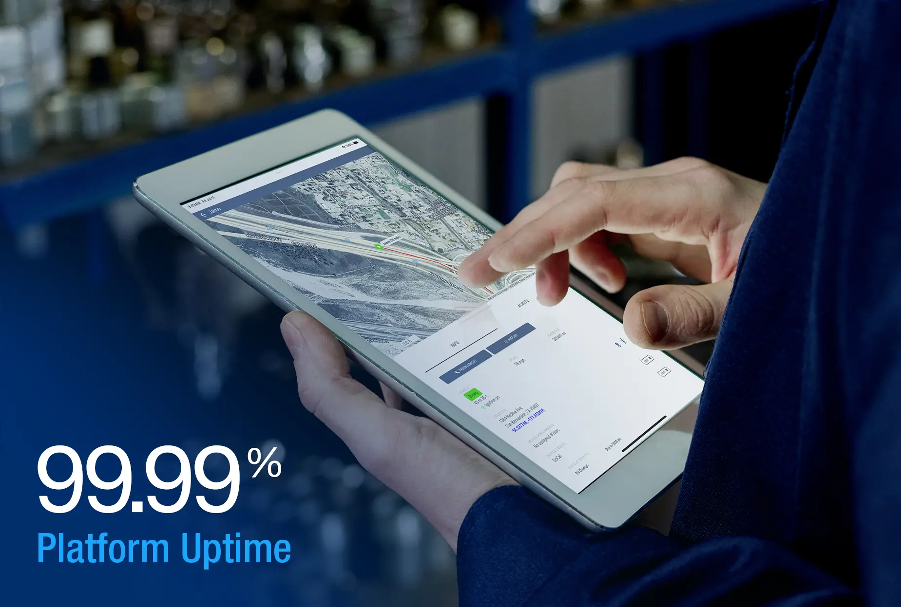 Man holding tablet with One Step GPS UI