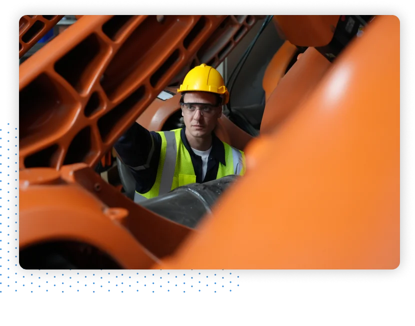 Worker Inspecting Equipment